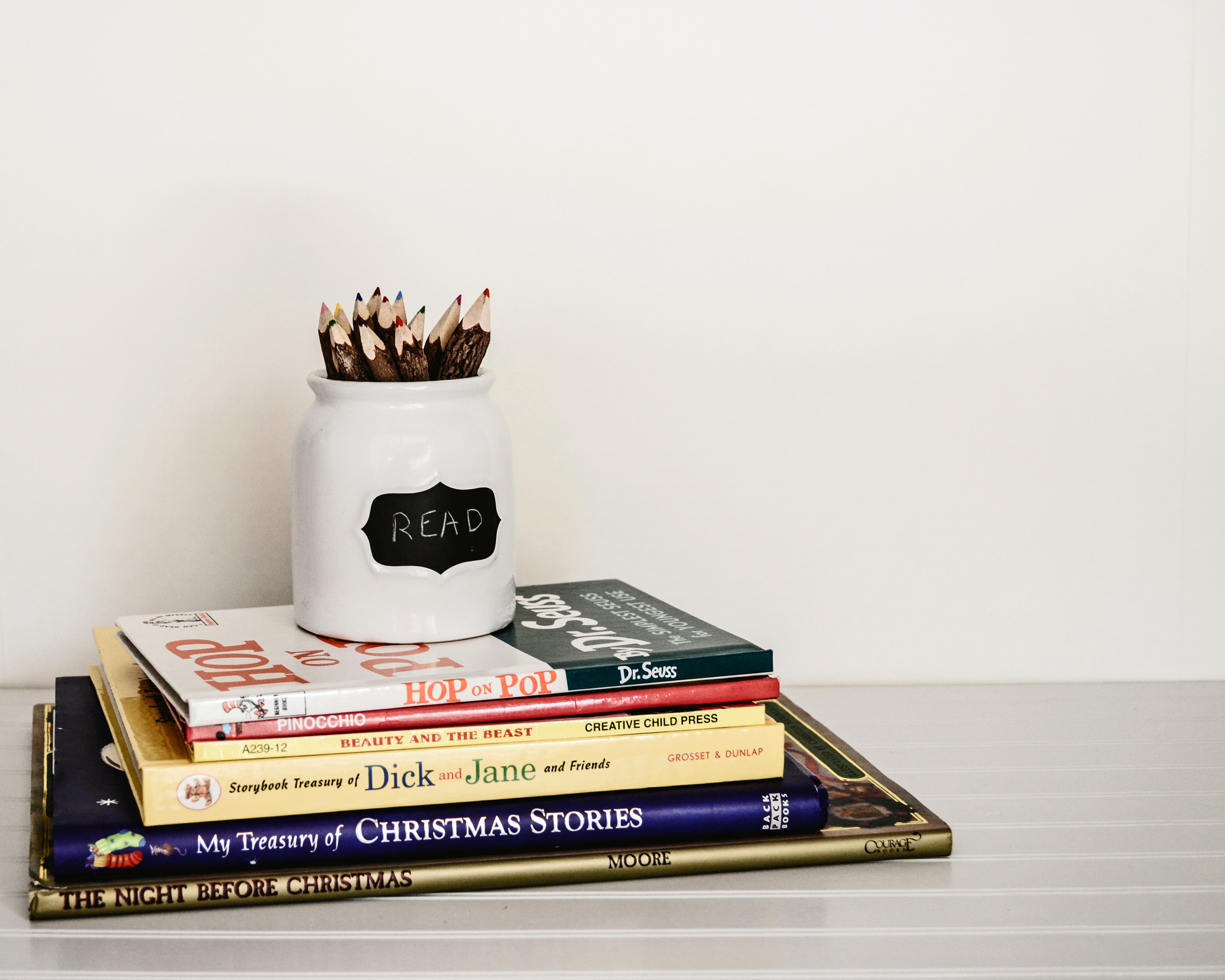 Pencil jar resting on books