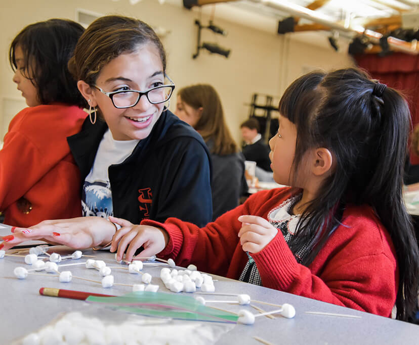 St. Luke's 8th graders get a fun filled day with their littles.