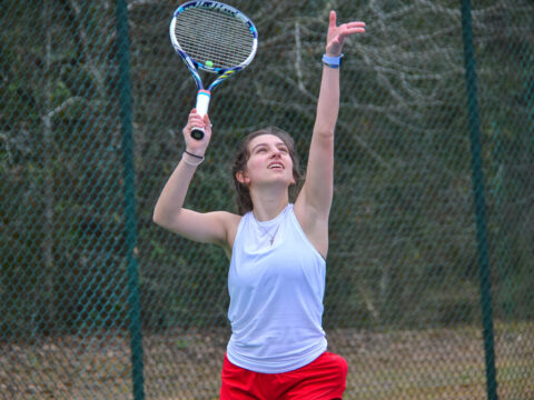 St. Luke's varsity girls tennis serve